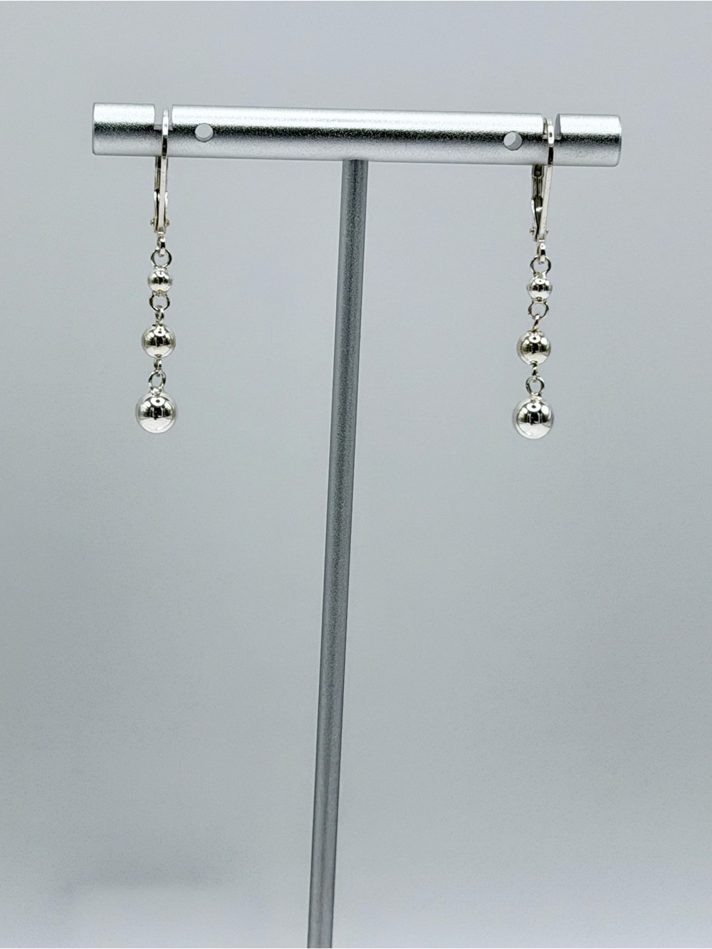 NWOT Sterling Silver Graduating Triple Ball Drop Lever-Back Earrings
